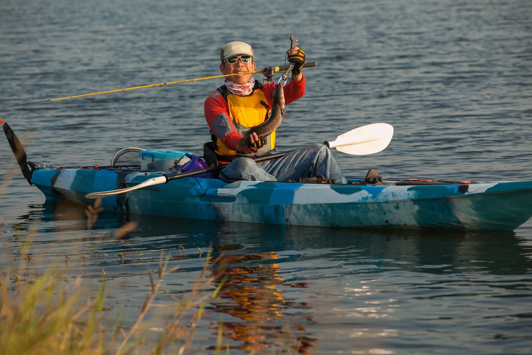 Catching Fish From Fishing Kayak